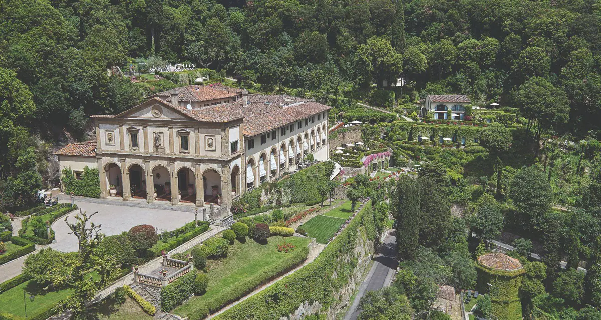 Day view of Belmond Villa San Michele main hotel building and terraces